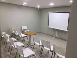 Área de negócios e/ou sala de conferências em Amapá Hotel