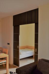 Кровать или кровати в номере Apartament Gabrysia 7