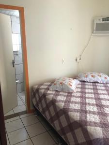 Cama o camas de una habitación en Apartamento Quadra Mar Itapema