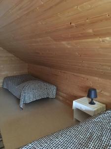 Кровать или кровати в номере Leipyölin tila