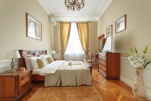 
Кровать или кровати в номере Kudrinskaya Tower
