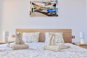 Postel nebo postele na pokoji v ubytování Sunny Ocean View Apartment + 27 fotografií
