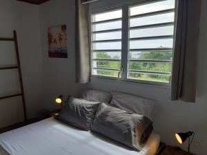 Llit o llits en una habitació de Villa Clémence