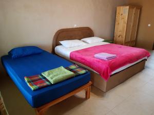 Postel nebo postele na pokoji v ubytování Baandin resort