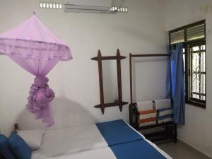 Letto o letti in una camera di Alass Ga For Pets Lovers