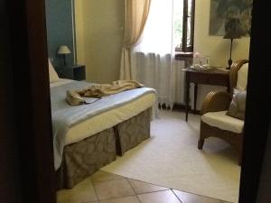 Postel nebo postele na pokoji v ubytování B&B Cosi fan Tutte