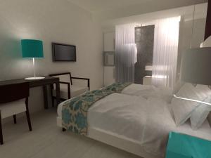 Postel nebo postele na pokoji v ubytování Hotel Sagittario