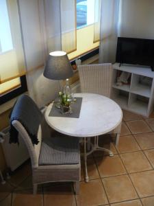 TV a/nebo společenská místnost v ubytování Privatzimmer Spahn in Mühlheim
