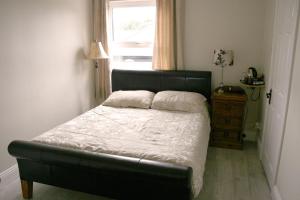 Postel nebo postele na pokoji v ubytování Celtic House B&B
