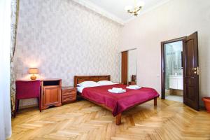 Postel nebo postele na pokoji v ubytování Cossacks Hostel