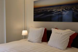 Postel nebo postele na pokoji v ubytování Leopold5 Luxe-Design Apartment
