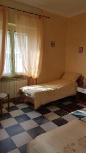 Postel nebo postele na pokoji v ubytování Guest house Il Nido