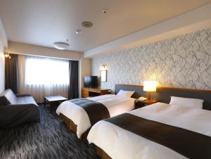 Katil atau katil-katil dalam bilik di Hachinohe Grand Hotel