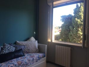 Posteľ alebo postele v izbe v ubytovaní Casa Ginestra Mare