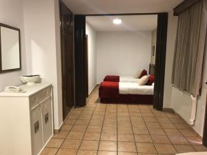 Postel nebo postele na pokoji v ubytování Hotel Patri