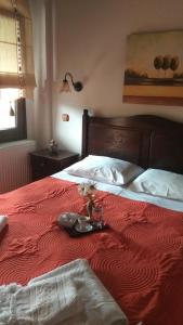 Postel nebo postele na pokoji v ubytování Evilion Traditional Inn