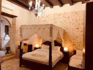 Postel nebo postele na pokoji v ubytování Boutique Hotel Del Doge