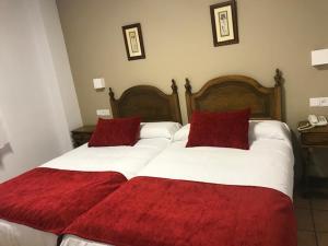 Postel nebo postele na pokoji v ubytování Hotel Patri
