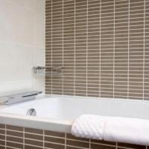 A bathroom at Karma Sanctum On The Green 