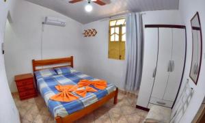 Postel nebo postele na pokoji v ubytování Pousada e Hostel Chapada Suites
