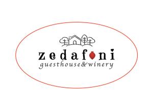 a logo for a custom home construction company at Guesthouse Zedafoni in Zestafoni