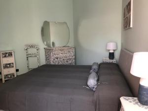 Postel nebo postele na pokoji v ubytování B&B Gloria Apartment