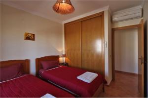 Postel nebo postele na pokoji v ubytování Bel appartement centre de Tavira