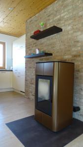 Kuchyň nebo kuchyňský kout v ubytování Appartement Elisa