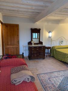 A bed or beds in a room at San Martino Vald'Afra