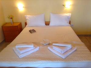 Ένα ή περισσότερα κρεβάτια σε δωμάτιο στο La Casa di Anastasia - Panorama Nea Karvali