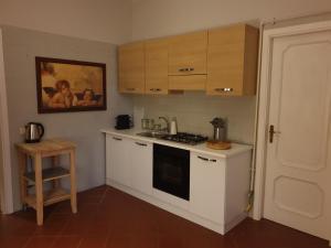A kitchen or kitchenette at Casa Mia Appartamento