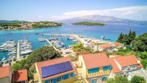 a view of a harbor with boats in the water at ECO Aparthotel The Dreamers's Club in Lumbarda