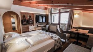 Posteľ alebo postele v izbe v ubytovaní Dolasilla Mountain Panoramic Wellness Hotel
