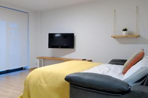 Un ou plusieurs lits dans un hébergement de l'établissement Apartamento Estella-Lizarra