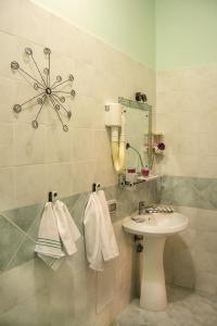Koupelna v ubytování Hotel Piccolo Sogno