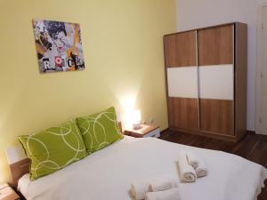 Posteľ alebo postele v izbe v ubytovaní Apartman Zelengaj