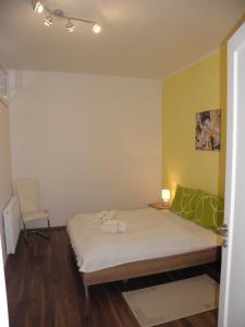 Posteľ alebo postele v izbe v ubytovaní Apartman Zelengaj