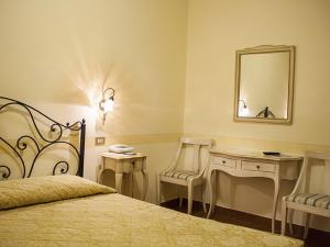 Voodi või voodid majutusasutuse Hotel Garnì Bartabel toas