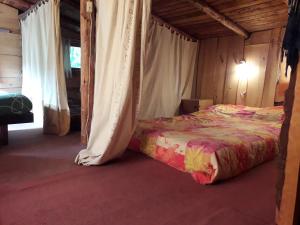 Ένα ή περισσότερα κρεβάτια σε δωμάτιο στο La Casa del Viajero Hostel
