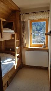Krevet ili kreveti na sprat u jedinici u okviru objekta Hiša Pod gorami**** - house with wellness