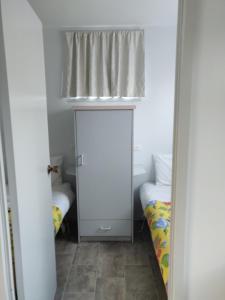 Postelja oz. postelje v sobi nastanitve Summers Rest Units