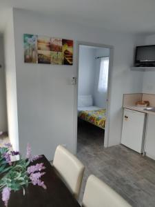 TV in/ali zabaviščno središče v nastanitvi Summers Rest Units