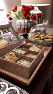 a table with two wooden trays filled with food at B&B Al borgo in Frascati