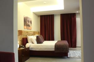 Letto o letti in una camera di Monoberge Hotel