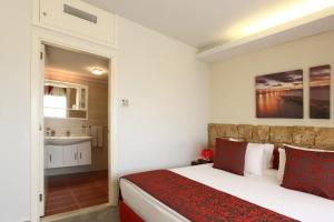 Letto o letti in una camera di Monoberge Hotel