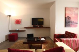TV o dispositivi per l'intrattenimento presso Monoberge Hotel