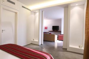 TV o dispositivi per l'intrattenimento presso Monoberge Hotel