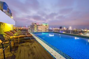 a large swimming pool on the roof of a building at Terra boutique hotel in Da Nang +60 photos