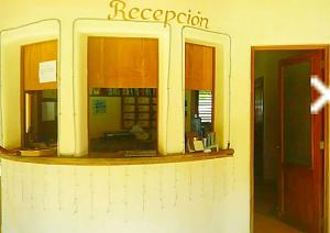uma área de recepção de um restaurante com uma janela em La Dolce Vita Beachfront Hotels, Las Terrenas, Samana em Las Terrenas