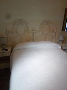 Postel nebo postele na pokoji v ubytování Hotel Sa Cralla